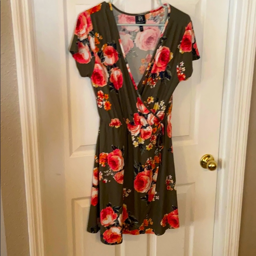 Short sleeve short faux wrap cotton dress.